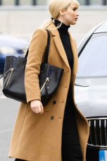 red-sparrow-dominika-egorova-brown-coat